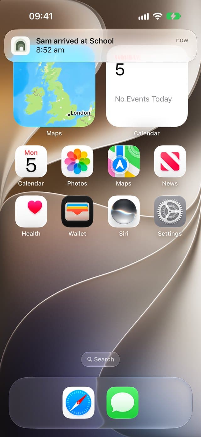 Notification on an iPhone: Sam arrived at School, 8:52am